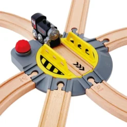 Plataforma giratoria de cambio de vías para circuitos de tren